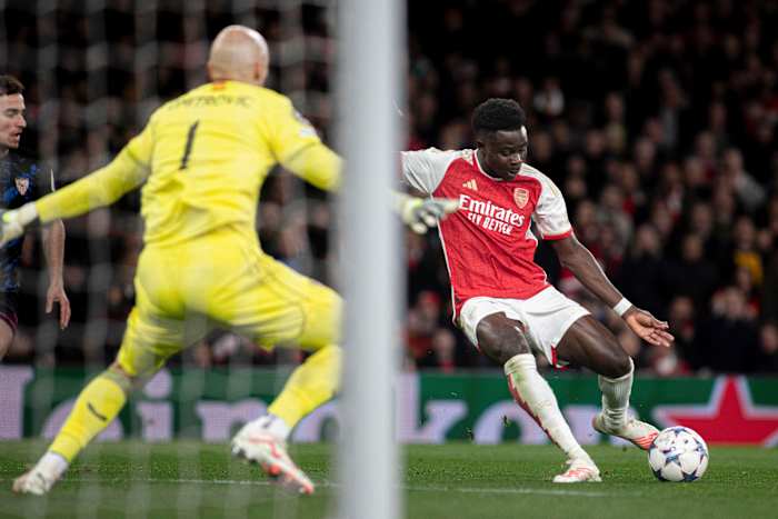 Bukayo Saka pictured (right) scoring for Arsenal in a 2-0 win over Sevilla in November 2023